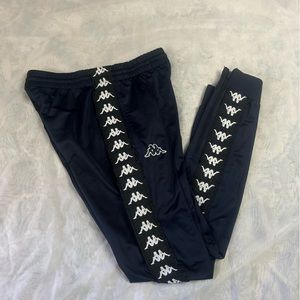 This is an original piece from Kappa. No imperfection, worn three times only.